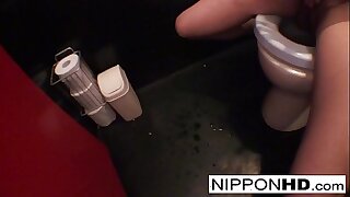 Japanese chip divide up masturbates in a public restroom