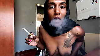 Desi in hijab smoking while debilitating nipple clamps